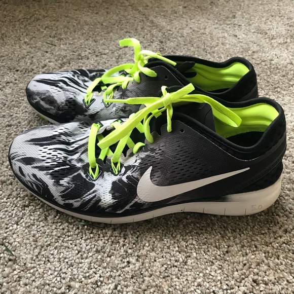 black and neon yellow nike shoes